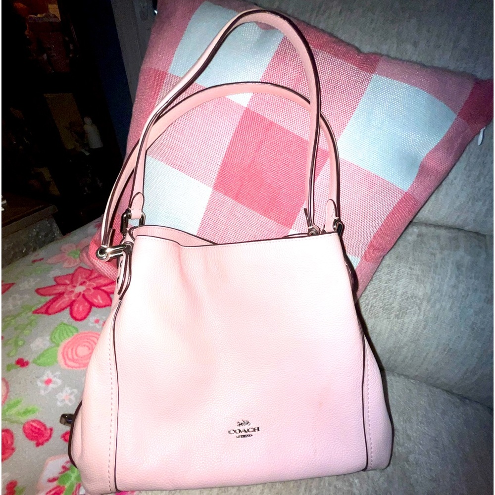 Pink Coach purse.